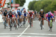 ADELAIDE, AUSTRALIA - JANUARY 17: Andre Greipel (front left) of Germany and team Lotto-Belisol finishes the race first in a photo finish with Alessandro Petacchi (far right) of Italy and team Lampre-ISD during stage one of the 2012 Tour Down Under on January 17, 2012 in Adelaide, Australia. (Photo by Morne de Klerk/Getty Images)