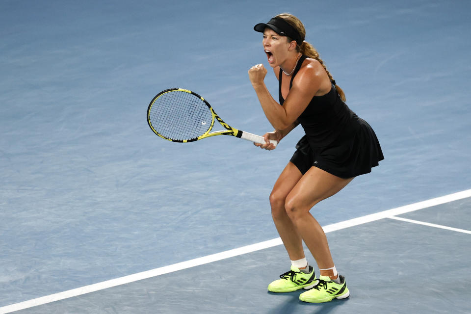 Danielle Collins of the U.S. reacts after winning a point against Iga Swiatek of Poland during their semifinal match at the Australian Open tennis championships in Melbourne, Australia, Thursday, Jan. 27, 2022. (AP Photo/Tertius Pickard)