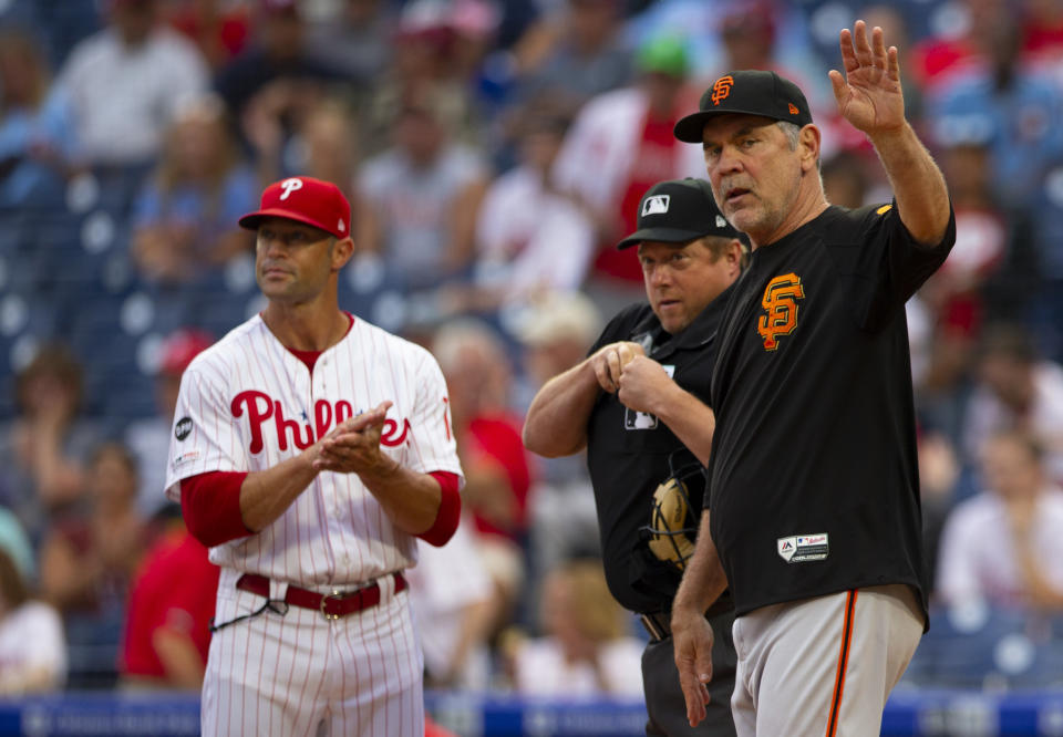 Former Phillies manager Gabe Kapler (left) is reportedly interviewing to replace Bruce Bochy as Giants manager. (Getty)