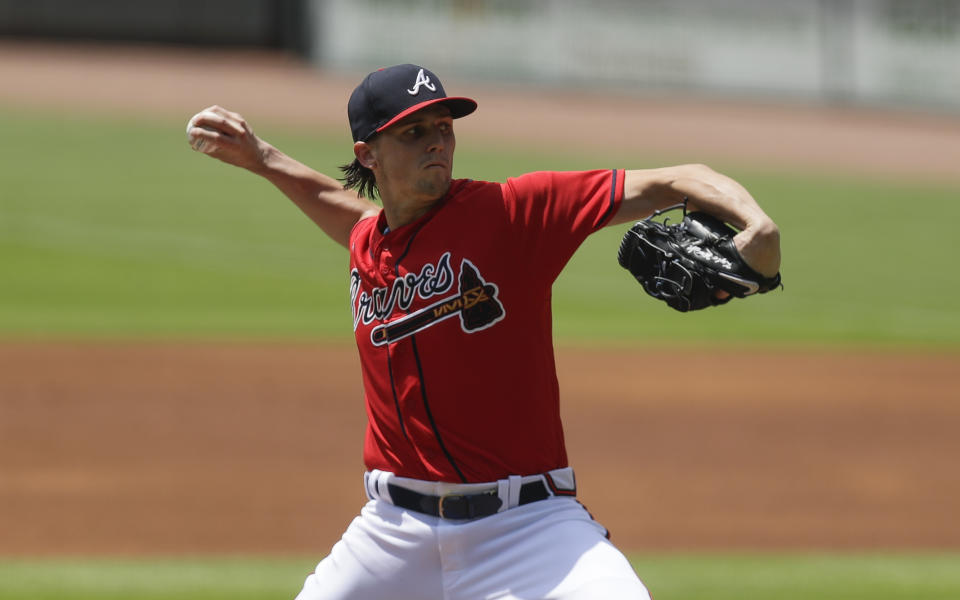 Atlanta Braves starting pitcher Kyle Wright delivers in the first inning of a baseball game against the New York Mets, Sunday, Aug. 2, 2020, in Atlanta. (AP Photo/Brynn Anderson)