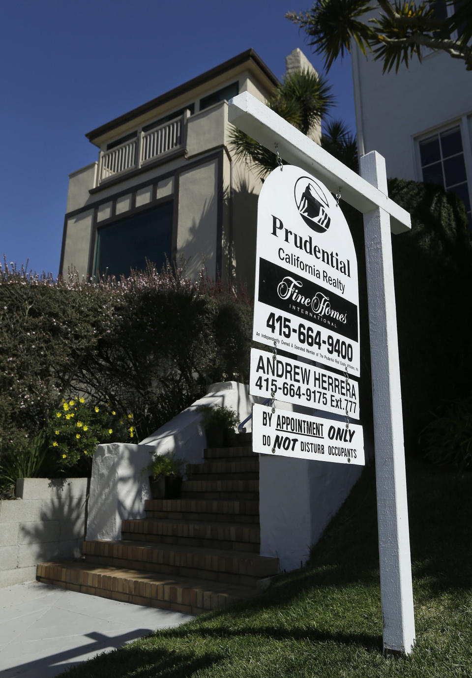 A realtor sign is shown in front of a home for sale in San Francisco, Monday, March 17, 2014. San Francisco will now lend as much as $200,000 to some homebuyers toward a down payment on their first house or condominium. Mayor Ed Lee's decision to double the previous limit of $100,000 was intended to help middle-class residents who have been hit hard by the housing crunch. (AP Photo/Jeff Chiu)