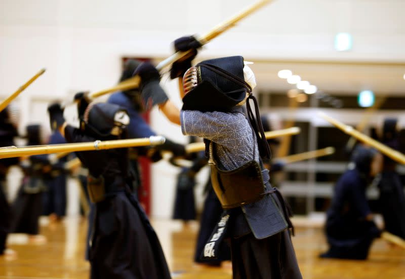 A child practices kendo at the gymnasium of a primary school in Fukuoka