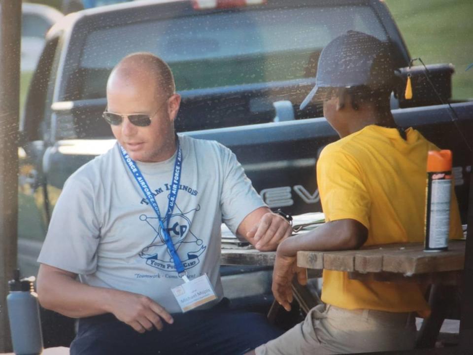 Capt. Mike Mojzis from O’Fallon Police Department is with a cadet at the fishing derby during the Team Illinois Youth Police Camp. This year’s camp will take place Sunday, July 16, through Saturday, July 22, at Principia College in Elsah, Illinois.