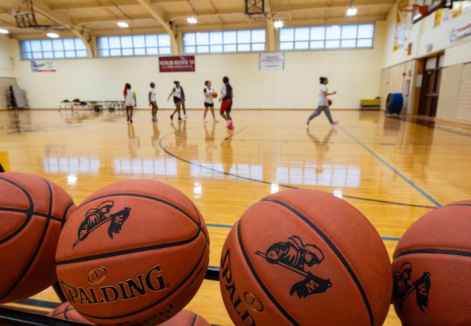 Members of the West High girls basketball team practice at the school on Tuesday. The team had to forfeit the remaining games on their schedule due to often not having enough players. Despite having no games to play, the remaining girls still come to practice every day.