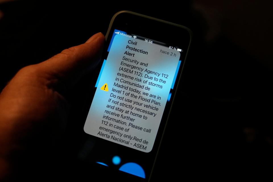 An alert from the Spanish Civil Protection in English is displayed Sunday on a phone in Madrid, Spain.