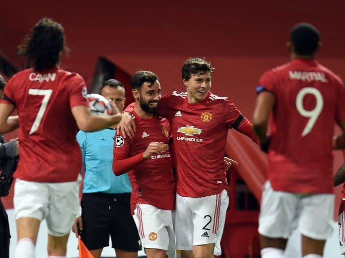 <p>Bruno Fernandes celebrates scoring the opening goal</p> (AFP)