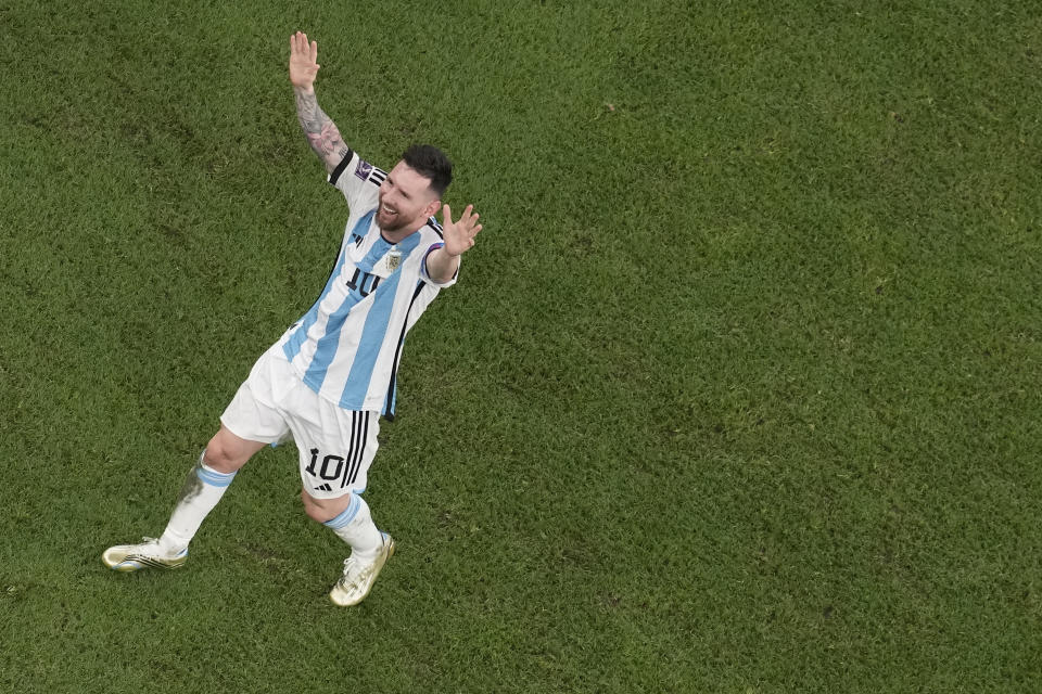 Argentina's Lionel Messi celebrates becoming World Champion after the penalty shootout of the World Cup final soccer match between Argentina and France at the Lusail Stadium in Lusail, Qatar, Sunday, Dec. 18, 2022. (AP Photo/Thanassis Stavrakis)