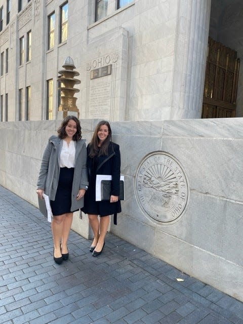 Madison and Kenzie Garverick, from left, passed the Ohio bar exam in 2022 and officially became attorneys in November.