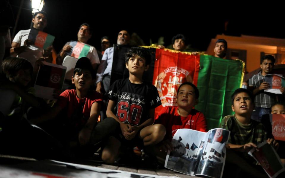 Children take part in a demonstration - REUTERS