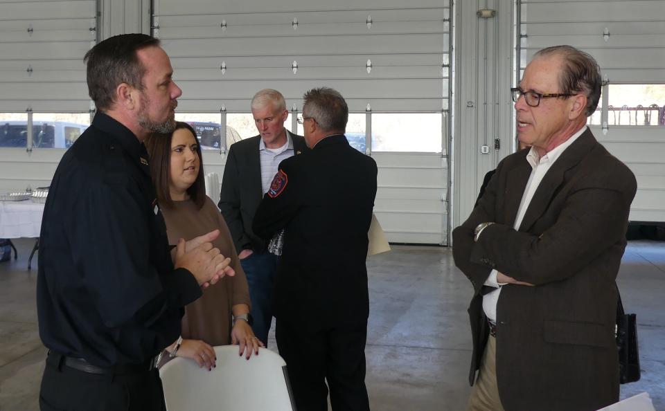 From left to right, Keegan and Tessa Higgs speak with U.S. Senator Mike Braun before the Safe Haven Baby Boxes dedication ceremony at Paoli Fire Station.