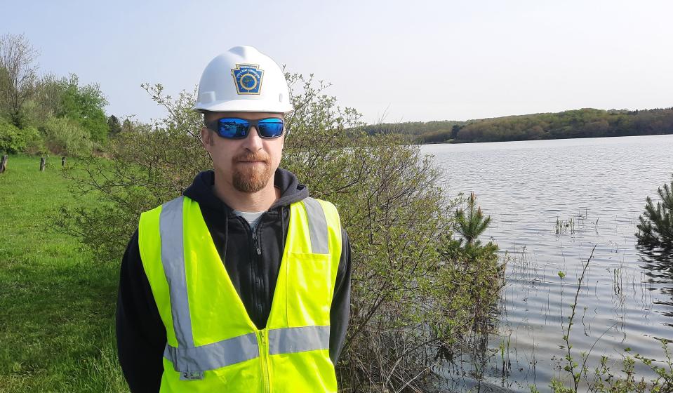 Ben Page, Pennsylvania Fish and Boat Commission Lake Habitat Section chief , monitors and improves waterways across the state. Here he helps with a project May 10, 2023, on Somerset Lake.