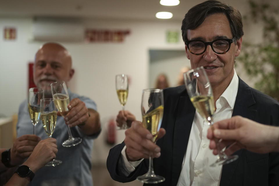 Socialist candidate Salvador Illa makes a toast with members of his team and party colleagues after the announcement of the results of the elections to the Catalan parliament in Barcelona, Sunday May 12, 2024. The Socialists led by former health minister Illa won a majority of 42 seats, up from their 33 seats in 2021 when they also barely won the most votes but were unable to form a government. They will still need to earn the backing of other parties to put Illa in charge.(AP Photo/Emilio Morenatti)