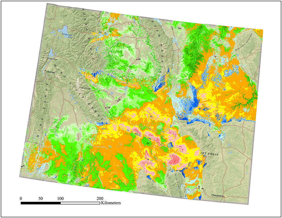 Spatial delineation of overlay between seven NREL wind power classes (WPC; 1-low wind value, 7-high wind value) and regional resource selection function maps grouped into seven geometric bins (see Fig 4 for color legend).Hatched areas are predicted low value for golden eagle nesting and wind development.