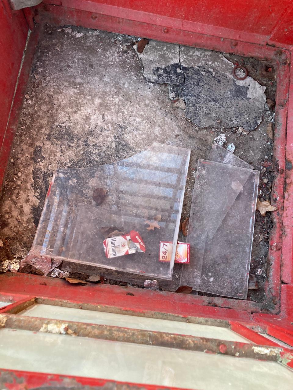 A run-down British red telephone booth has been a dumping ground for some as it stands outside the Portsmouth Historical Society.