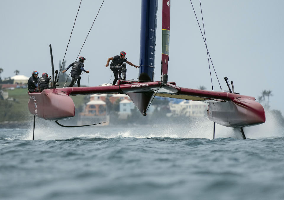 In this photo provided by SailGP, the Britain SailGP Team presented by INEOS, helmed by Sir Ben Ainslie, competes during the final on race Day 2 of the Bermuda SailGP event in Hamilton, Bermuda, Sunday, April 25, 2021. (Thomas Lovelockn/SailGP via AP)