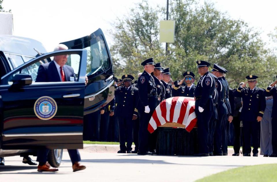 Members of the Arlington Police Department’s Honor Guard prepare to place the coffin of fellow officer Darrin McMichael into the hearse on Wednesday, September 27, 2023, at Crossroads Christian Church in Grand Prairie. McMichael, a member of Arlington’s Motorcycle Unit, was killed on Sept. 21.