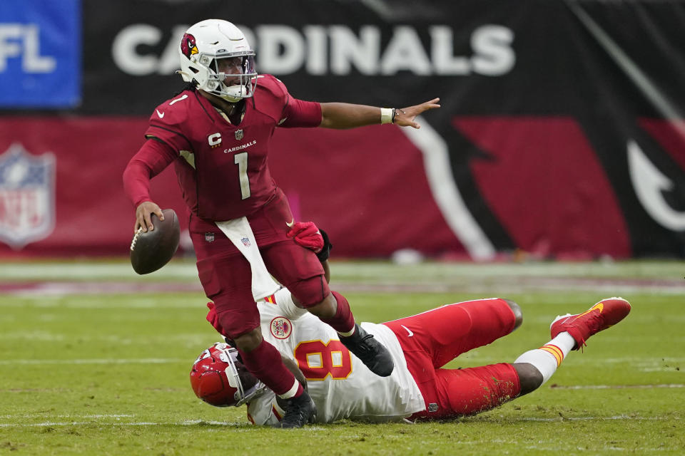 Kansas City Chiefs defensive end Carlos Dunlap (8) sacks Arizona Cardinals quarterback Kyler Murray (1) during the second half of an NFL football game, Sunday, Sept. 11, 2022, in Glendale, Ariz. (AP Photo/Matt York)