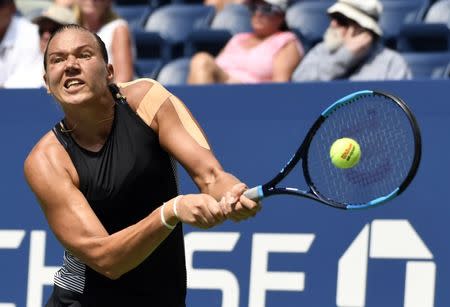 Aug 27, 2018; New York, NY, USA; Kaia Kanepi of Estonia hits to Simona Halep (not pictured) of Romania on day one of the 2018 U.S. Open tennis tournament at USTA Billie Jean King National Tennis Center. Mandatory Credit: Danielle Parhizkaran-USA TODAY Sports