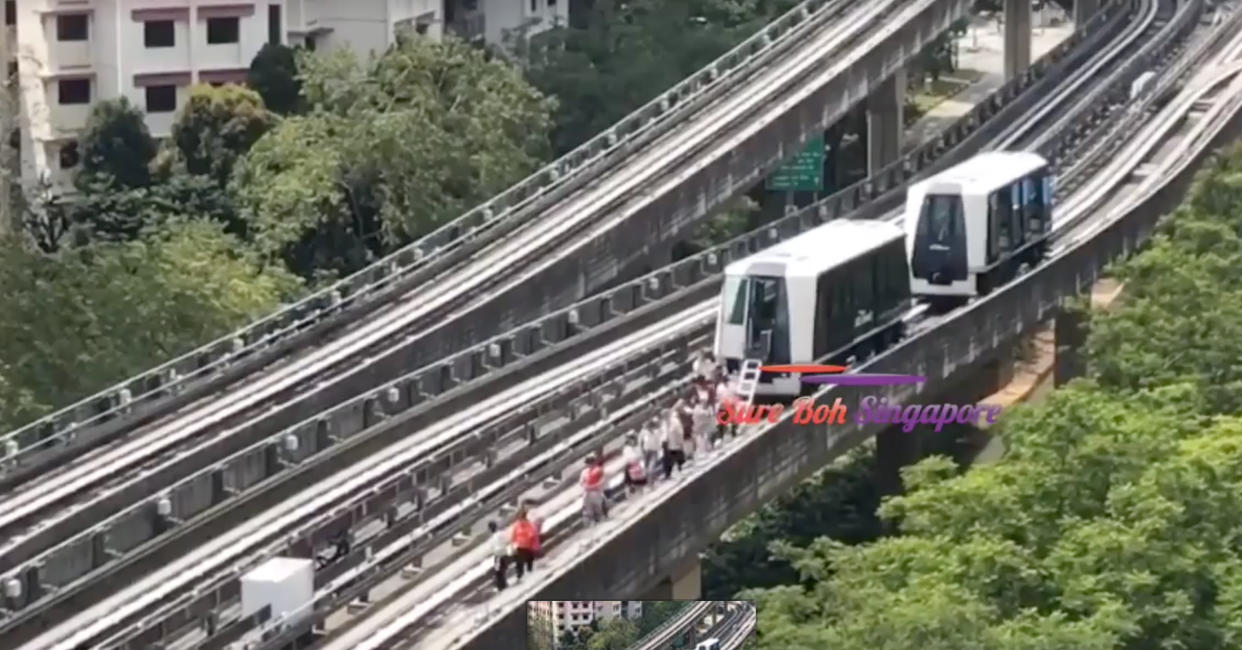 Passengers detrained from a stalled light rail vehicle in Sengkang on Friday, 16 February 2018. (Screenshot of Facebook video)