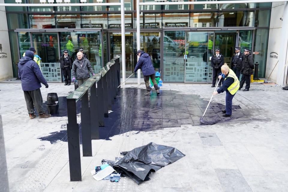 Black paint on the pavement outside the Home Office and the Department of Levelling Up, Housing &amp; Communities in London, following a protest by members of Extinction Rebellion. Picture date: Wednesday January 18, 2023. (PA Wire)