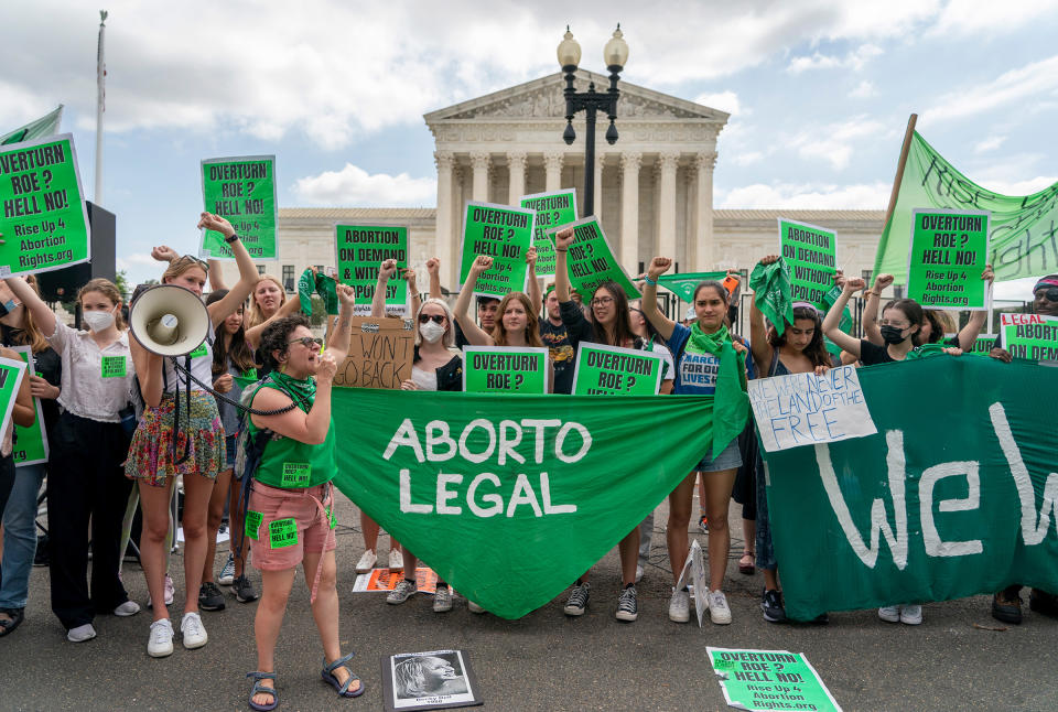 Abortion-rights protesters gather outside the Supreme court in Washington, D.C., following the court's decision to overturn Roe v. Wade, on June 24, 2022.<span class="copyright">Gemunu Amarasinghe—AP</span>