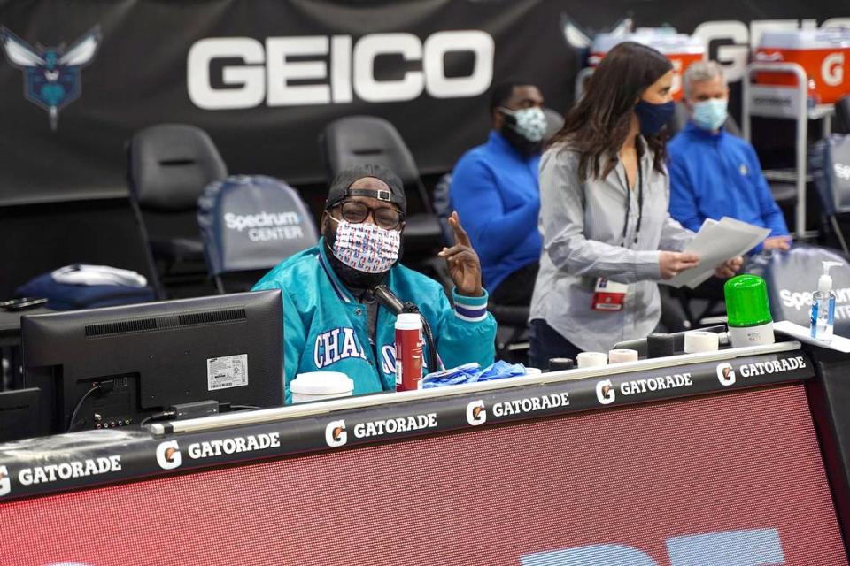 Patrick “Big Pat” Doughty smiles behind his mask before calling the Charlotte Hornets game on Wednesday, Jan. 13, 2021, on the public address system at Spectrum Center. Doughty has been the team’s P.A. announcer since 2004.