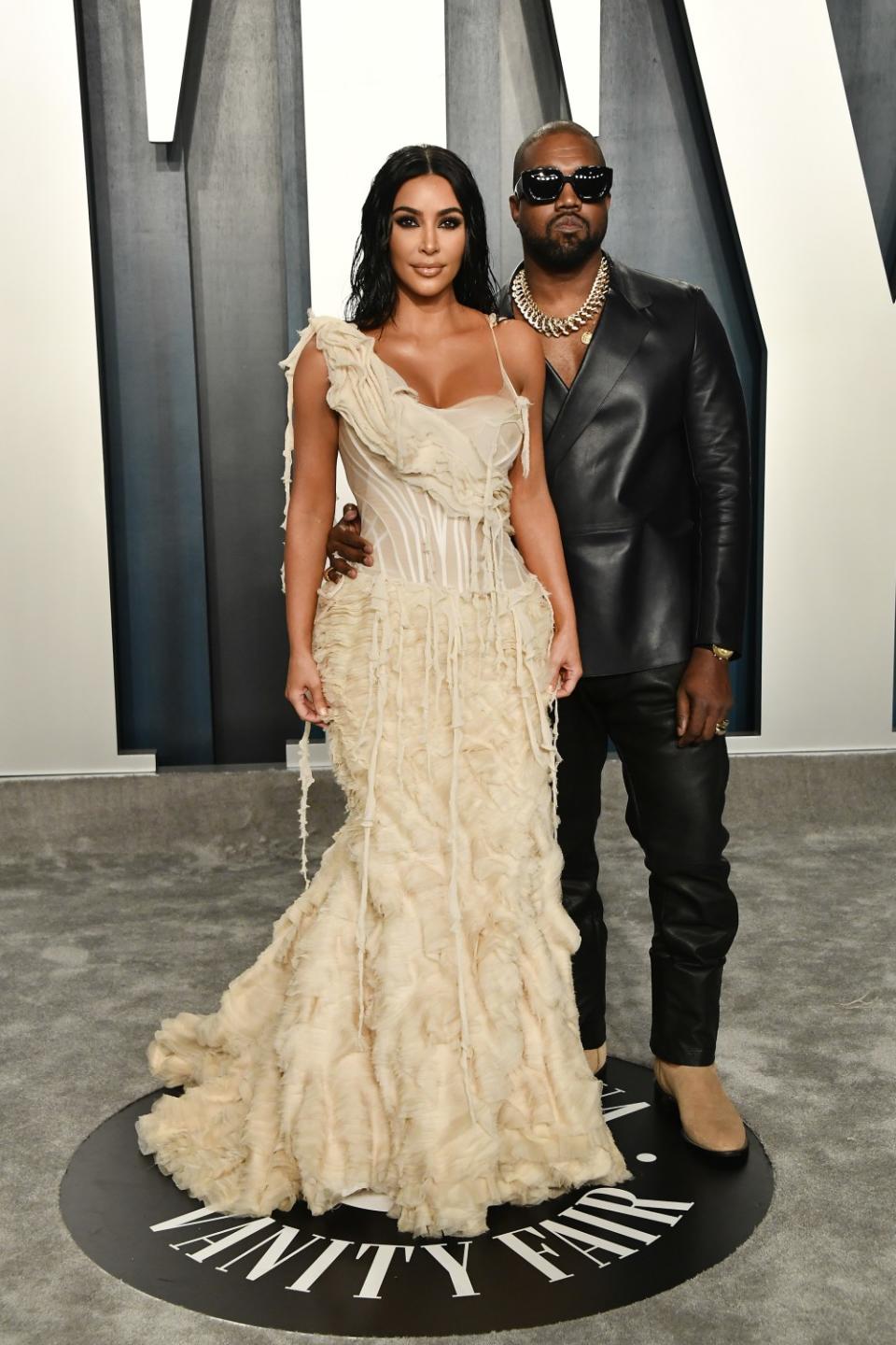 Kim Kardashian West, left, and husband Kanye West