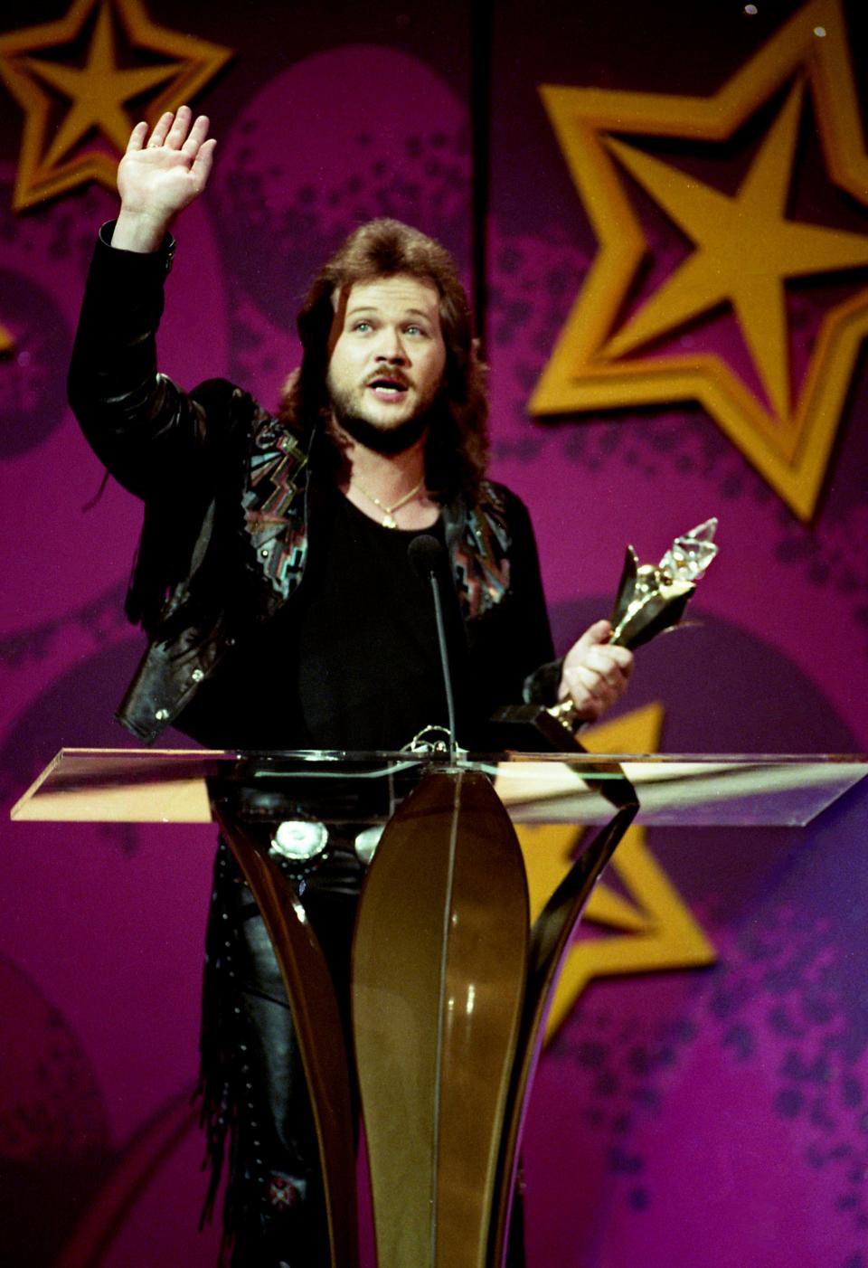 A very happy Travis Tritt speaks after winning the Star of Tomorrow Award during the 26th annual TNN/Music City News Country Award show at the Grand Ole Opry June 8, 1992.