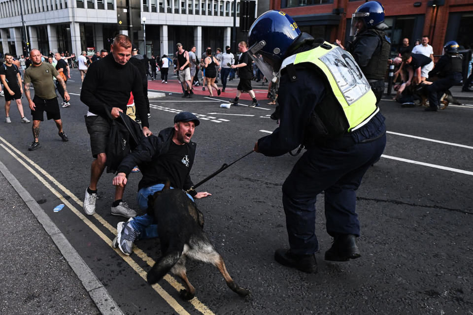 UK police prepared for planned far-right protests and other demonstrations this weekend after two nights of unrest in several English towns and cities following a mass stabbing that killed three girls.  (Justin Tallis/AFP – Getty Images)