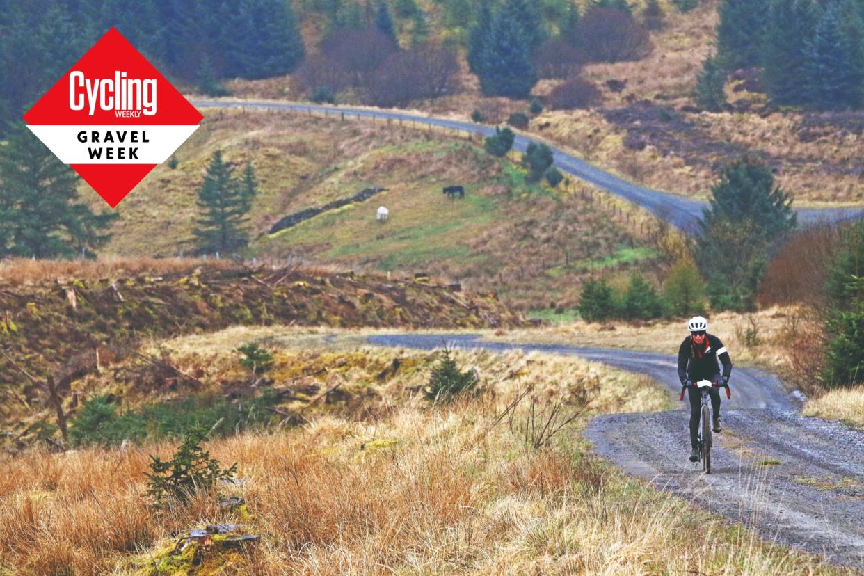  A female gravel rider on a beautiful track in the Dirty Reiver race 