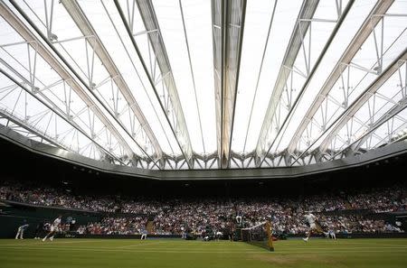 Britain Tennis - Wimbledon - All England Lawn Tennis & Croquet Club, Wimbledon, England - 1/7/16 Argentina's Juan Martin Del Potro in action against Switzerland's Stan Wawrinka REUTERS/Paul Childs