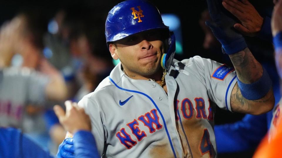 May 27, 2023; Denver, Colorado, USA; New York Mets catcher Francisco Alvarez (4) celebrates after hitting a three run home run against the Colorado Rockies in the sixth inning at Coors Field.