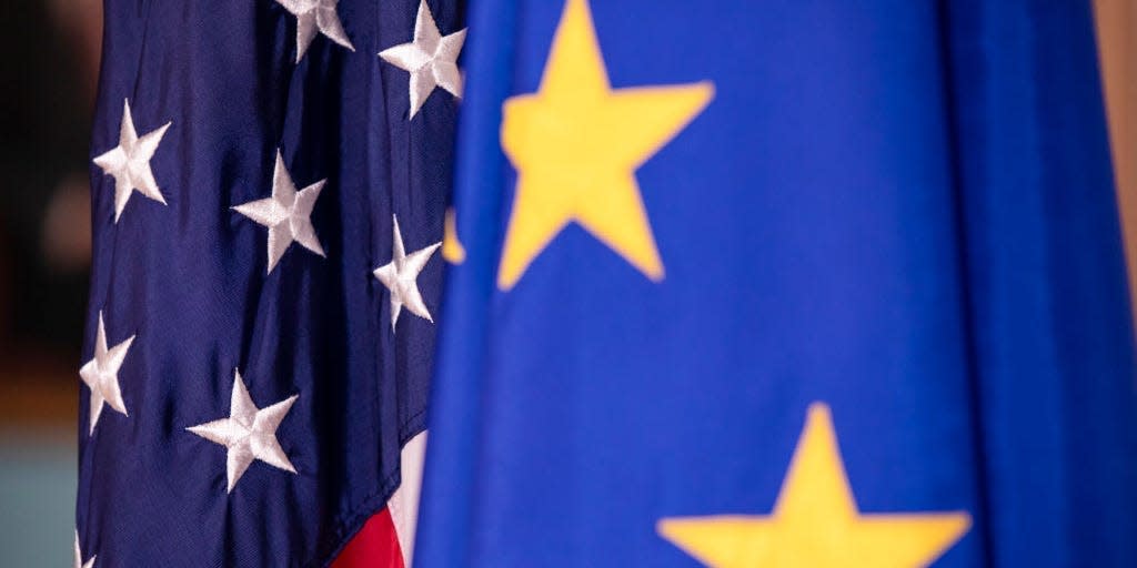 The European Union and United States flags on display before a meeting