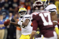 Denard Robinson #16 of the Michigan Wolverines throws a pass against the Virginia Tech Hokies during the Allstate Sugar Bowl at Mercedes-Benz Superdome on January 3, 2012 in New Orleans, Louisiana. (Photo by Matthew Stockman/Getty Images)