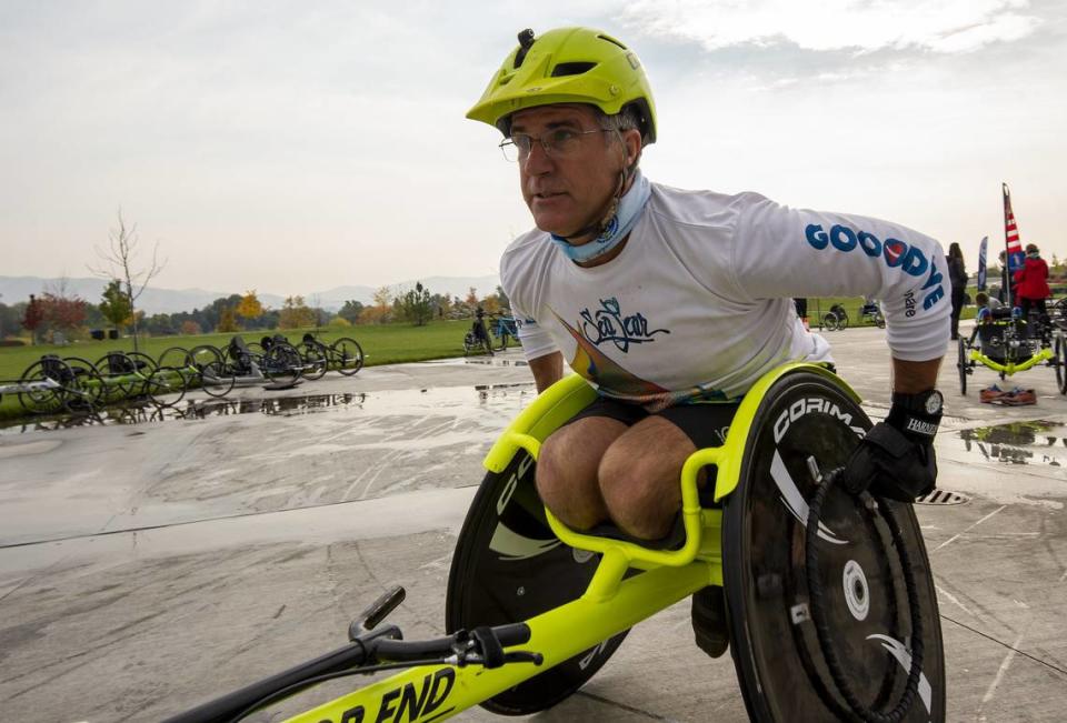 U.S. Army and Air National Guard veteran Bruce Cooper races in his modified bicycle. In June, he completed a triathlon.
