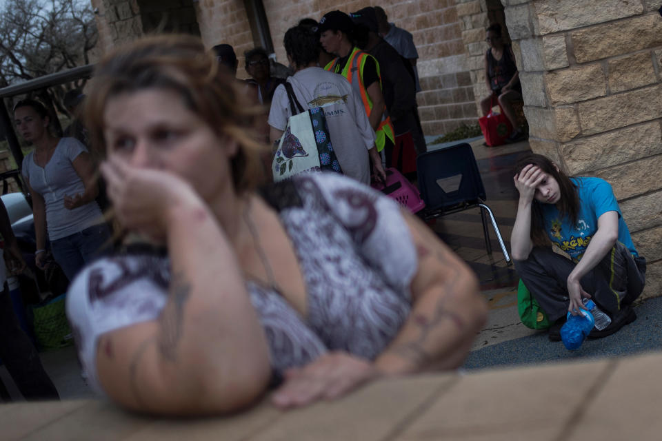 <p>Melanie Starnauld and her 19-year-old son Mathew, who lost their home to Hurricane Harvey, await to be evacuated from Rockport, Texas, Aug. 26, 2017. (Photo: Adrees Latif/Reuters) </p>