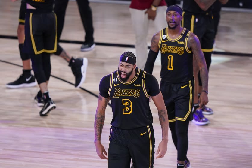 Los Angeles Lakers' Anthony Davis (3) celebrates after an NBA conference final playoff basketball game.