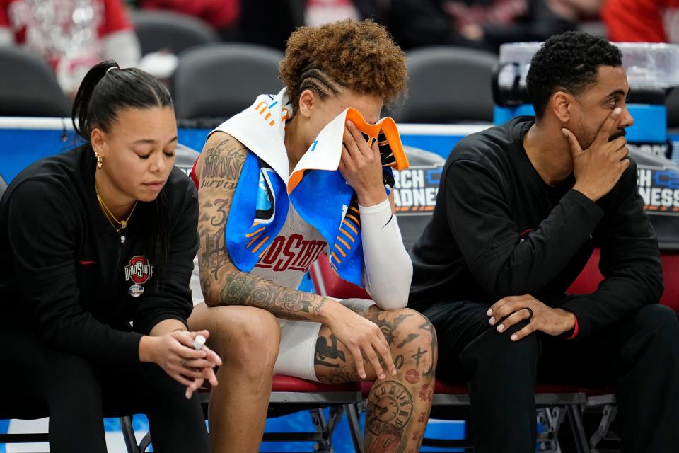 Ohio State guard Rikki Harris wipes her face in the final minute of Sunday's loss to Duke.