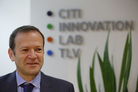 Neil Corney, Citi Israel's chief country officer smiles during an interview with Reuters at Citi's tech hub in Tel Aviv, Israel December 14, 2015. REUTERS/Amir Cohen