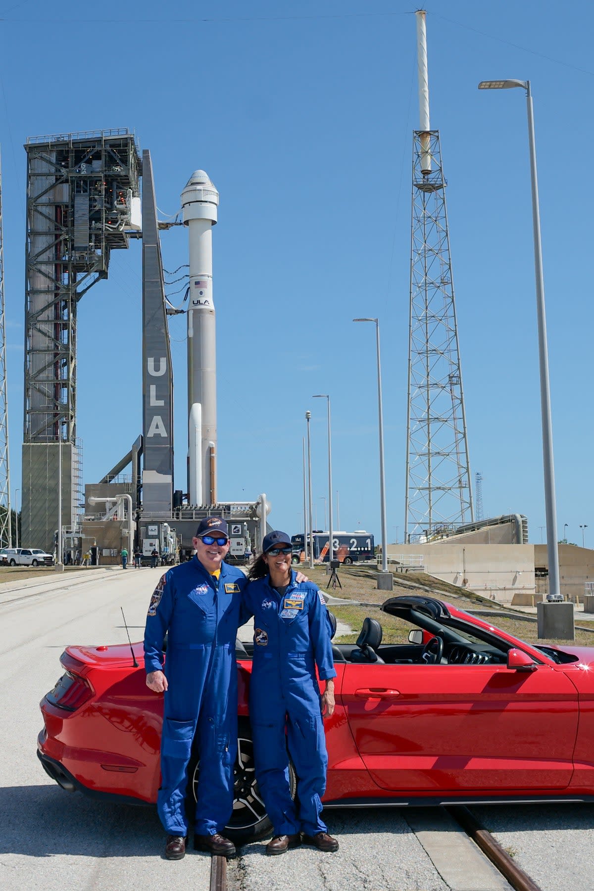 NASA astronauts Butch Wilmore and Suni Williams pose for a picture after a United Launch Alliance Atlas V rocket with Boeing's CST-100 Starliner spacecraft aboard was rolled out of the Vertical Integration Facility to the launch pad at Space Launch Complex 41 ahead of the NASA’s Boeing Crew Flight Test, Saturday, May 4, 2024 at Cape Canaveral Space Force Station in Florida. ((NASA/Joel Kowsky))