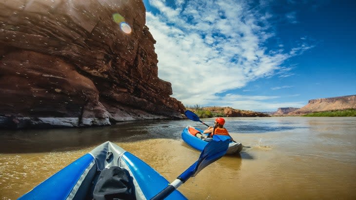 Paddling the Colorado River near Moab in Inflatable kayaks