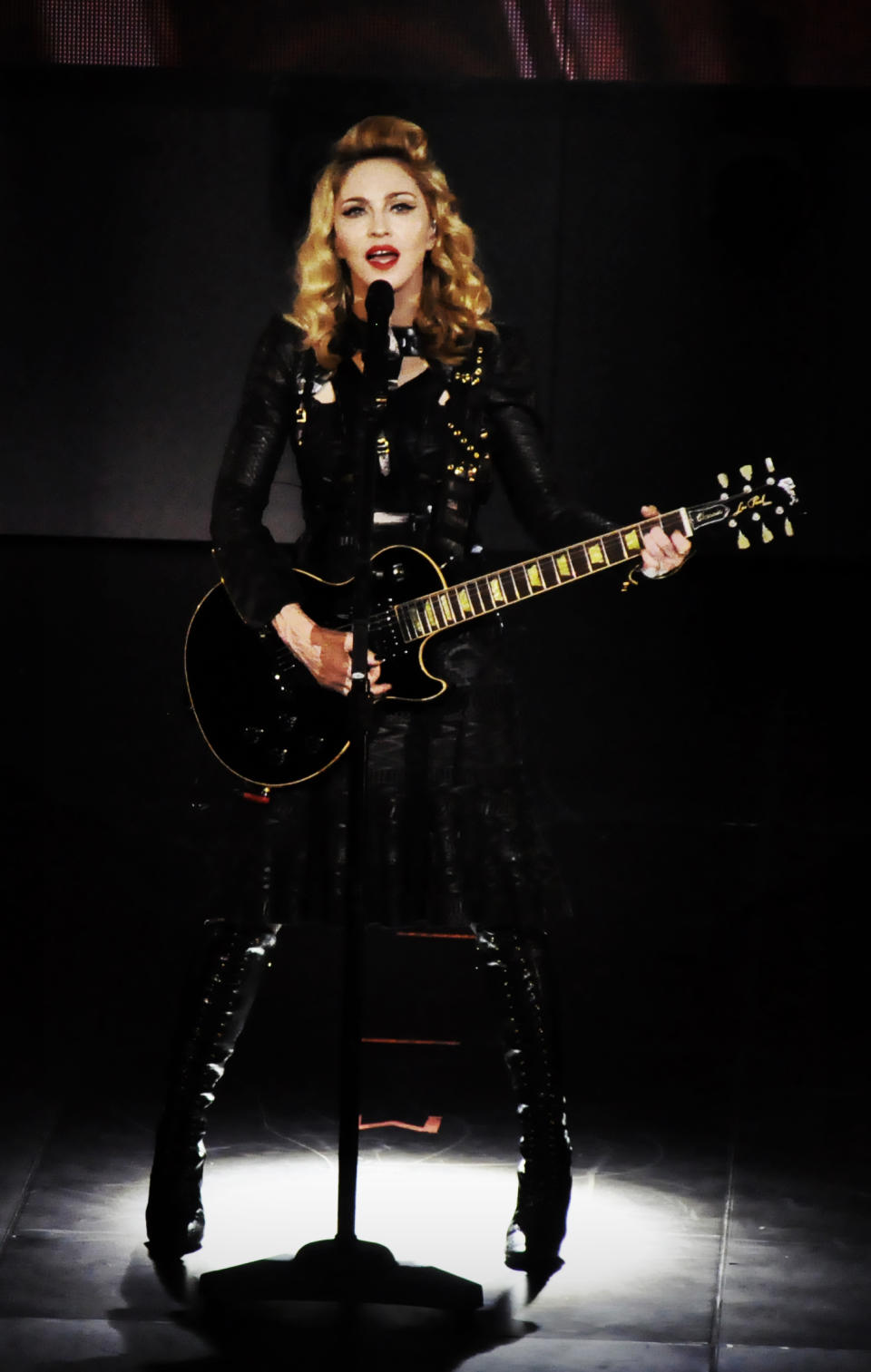 In this photo provided by Guy Oseary, Madonna performs on stage during her MDNA concert at Olympia Hall in Paris on Thursday, July 26, 2012. (AP Photo/Guy Oseary)