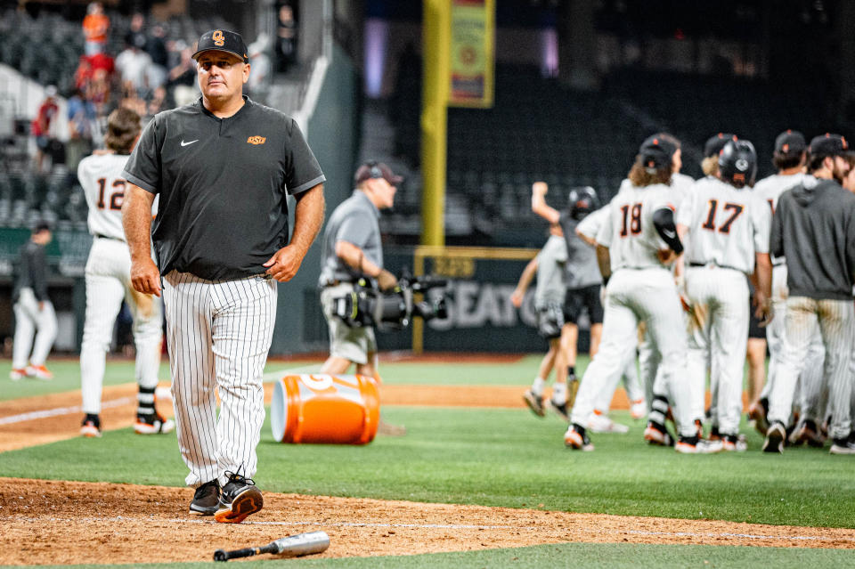 Oklahoma State coach Josh Holliday walks off the field after a 6-5 win against Texas Tech in the Big 12 baseball tournament on Saturday, May 27, 2023, at Globe Life Field in Arlington, Texas.