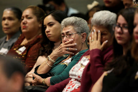 Relatives of five youths killed in 2016 after police kidnapped them and then turned them over to members of a drug gang, react during a public apology by the Veracruz state government, in Mexico City, Mexico March 4, 2019. REUTERS/Daniel Becerril