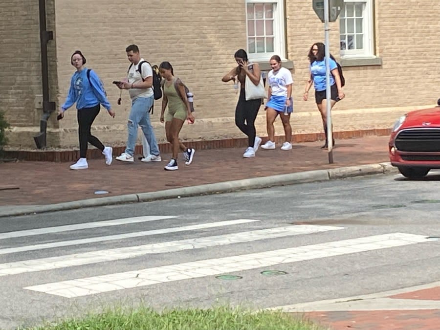 Students walking on UNC’s campus after an emergency lockdown was lifted. (Terrence Evans/CBS 17)