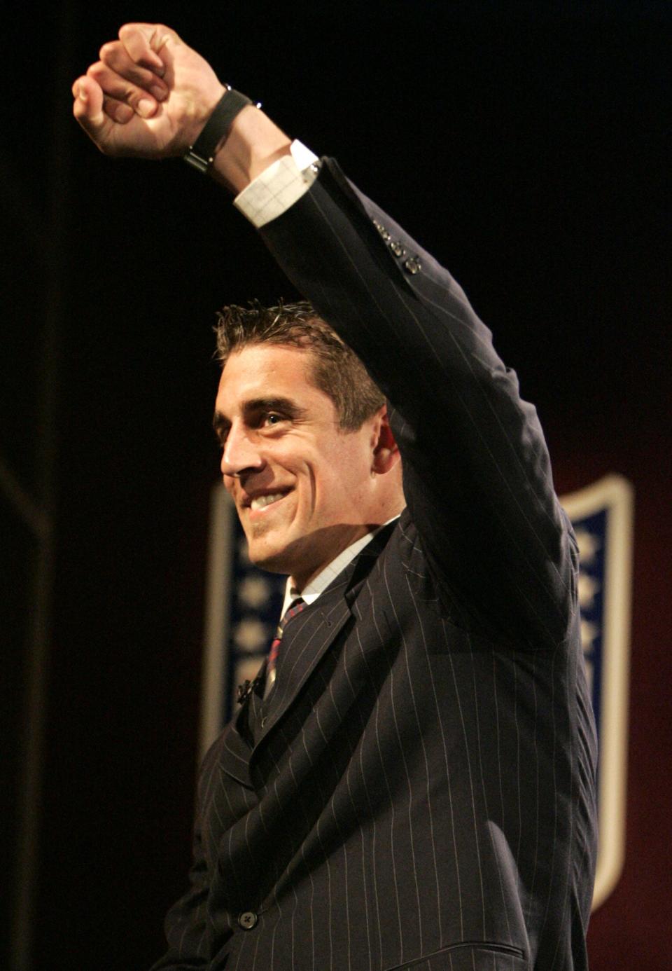 Aaron Rodgers reacts after being selected by the Packers as the 24th overall pick the 2005 NFL draft.