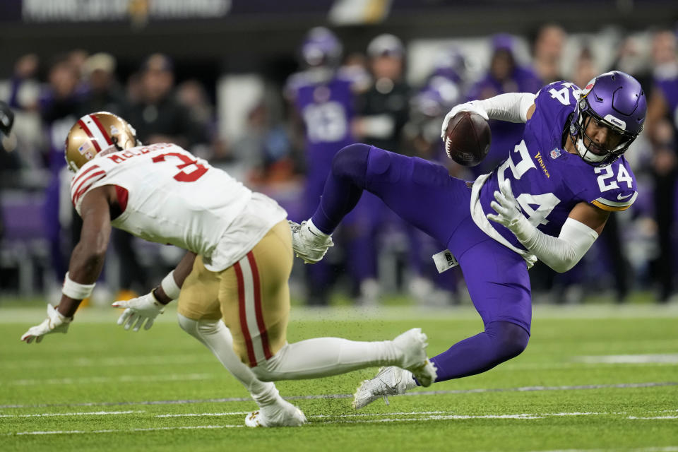 Minnesota Vikings safety Camryn Bynum (24) intercepts a pass intended for San Francisco 49ers wide receiver Ray-Ray McCloud III (3) during the second half of an NFL football game, Monday, Oct. 23, 2023, in Minneapolis. The Vikings won 22-17. (AP Photo/Abbie Parr)