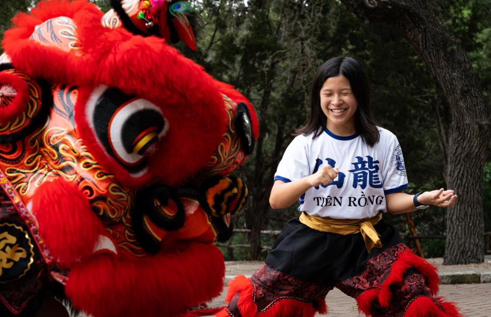 Jordyn Chang instructs a teammate controlling the lion head during a Heavenly Dragon Lion Dance Association practice at the Fo Guang Shan Xiang Yun Temple in Austin, May 11, 2024. Supporting the lion head and moving it properly requires both strength and good form.