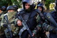 Police officers take part in a ceremony at the General Command of the police in La Paz