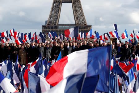 FILE PHOTO: Francois Fillon, former French prime minister, member of The Republicans political party and 2017 presidential election candidate of the French centre-right, attends a meeting at the Trocadero square across from the Eiffel Tower in Paris, France, March 5, 2017. REUTERS/Philippe Wojazer/File Photo